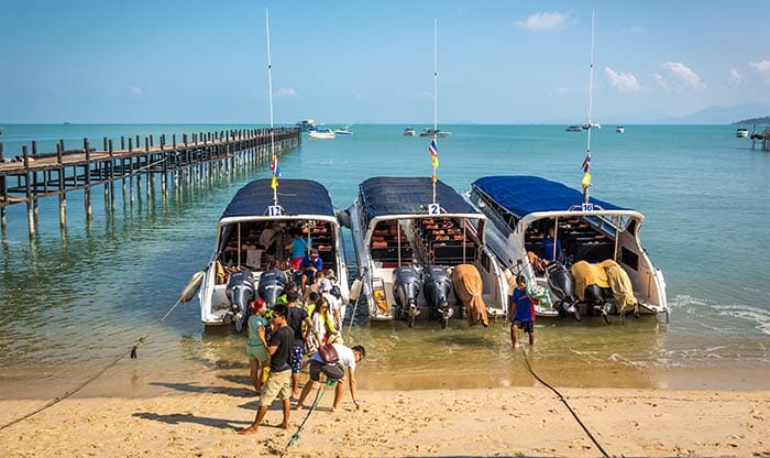 Travelers waiting for speedboat from Koh Samui to Koh Tao