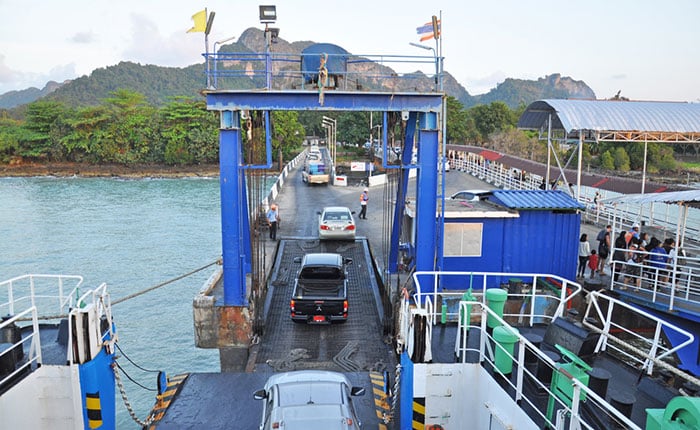 Cars drive off ferry at Donsak Pier