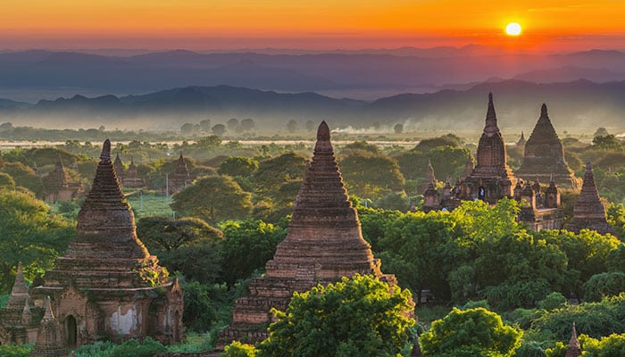 Bagan old ancient archeology temple famous destination at sunset