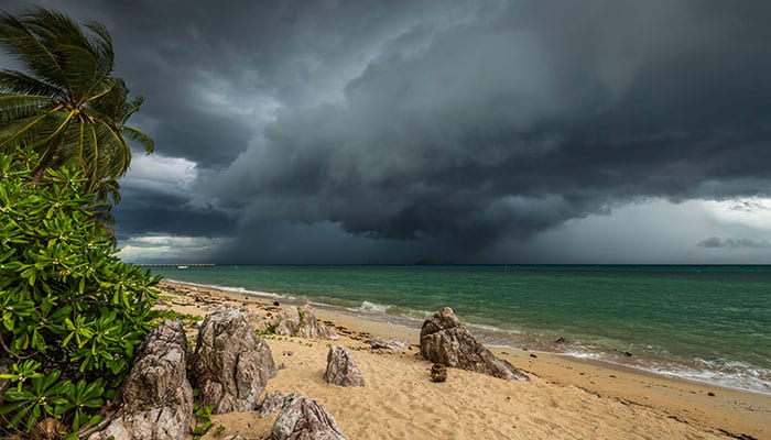 Dark rainy sky on a beach in Thailand