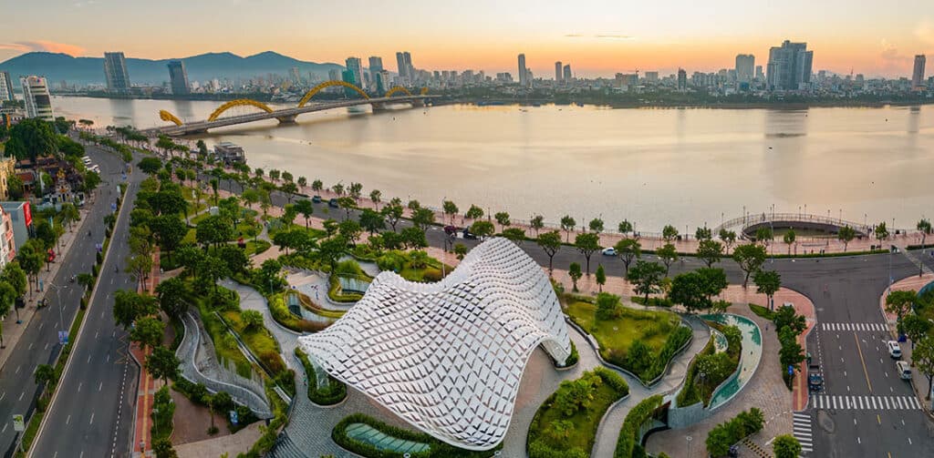 Aerial view of Da Nang Apec sculpture park at sunrise which is a new icon of Da Nang city. Dragon bridge behind