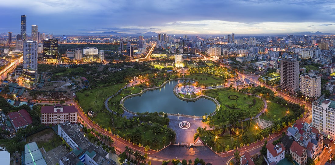 Hanoi skyline cityscape at twilight period. Aerial view of Cau Giay park, west of Hanoi.