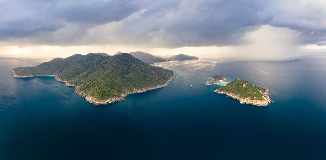 View of Koh Tao from above, drone shot with spectacular clouds