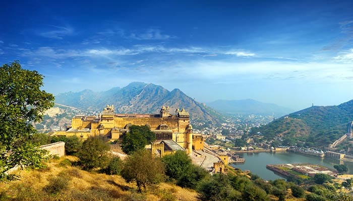 India Jaipur Amber fort in Rajasthan. Ancient indian palace architecture sunset panoramic view