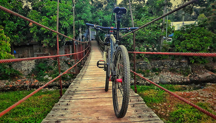 Mountain Bike on that hanging bridge, this was taken at the Banica River in Dumaguete City.