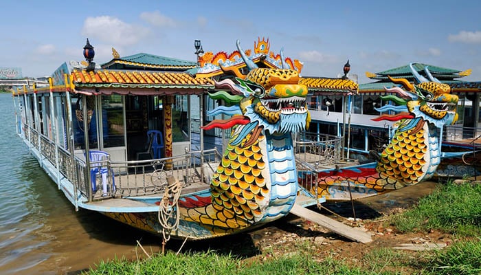 Dragon head and excursion boat, Song Huong or Huong Giang or Perfume River, near Hue, North Vietnam