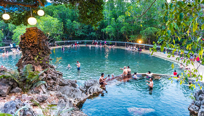 Swimmers at Maquinit Hot Spring at Busuanga island near Coron town 