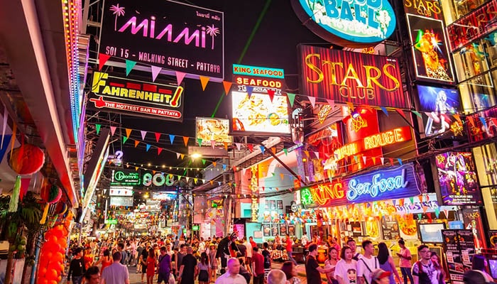Walking Street with many go-go bars and night clubs in night time Pattaya