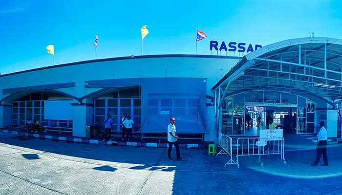 Panoramic view of Rassada Pier in Phuket with tourists boarding ferries to Phi Phi Don on a beautiful day with clear blue sky, taken on December 23, 2019.